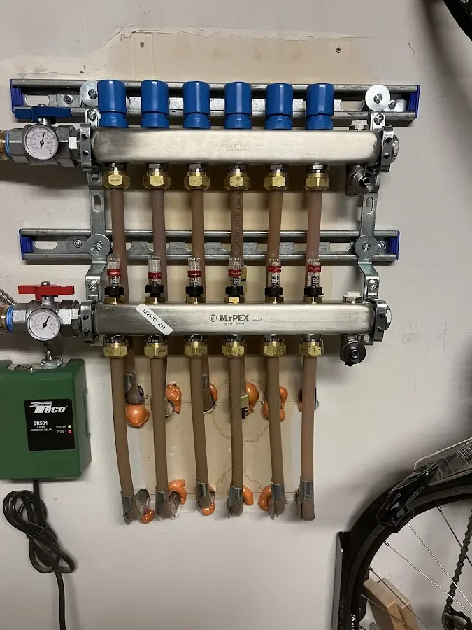 Plumber performing Leak Detection at a residential property in Athens